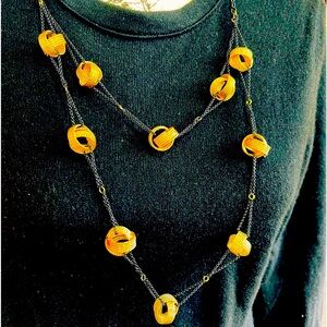 Amrita Singh, fabulous two tiered gold knot & chain.